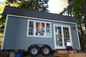 Liz And Tyler Cragg Built This Cozy Cottage Style Tiny House On An 8 39 X20 39 Trailer So They Could Have The Tiny House Tiny House Living Tiny House Swoon