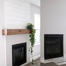 Shiplap looks nice on the wall. Simple Refresh Of A Fireplace In A Farmhouse Style With Penny Tile And Shiplap Simple Fireplace Shiplap Fireplace Tile And Shiplap Fireplace