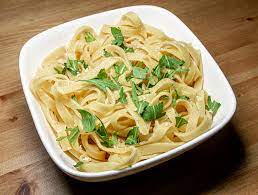 fettut'tʃiːne alˈfreːdo) or fettuccine al burro (fettuccine with butter) is an italian pasta dish of fresh fettuccine tossed with butter and parmesan cheese. Fettuccine Alfredo Tag National Fettuccine Alfredo Day In Den Usa