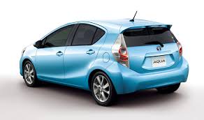 Toyota aqua in a motor show 2012 Toyota Prius C Unveiled Compact 52 Mpg Plus Hybrid Hatchback