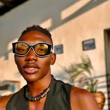 I'm back. This is from a Japanese obi. I've sewn it together at the front  and used some gold and black shiny material for the back. I'm incredibly  fortunate to have access