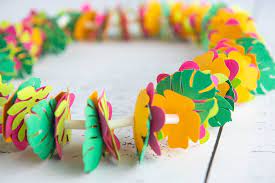 Get creative with clever projects that cost next to nothing to make. Diy Hawaiian Luau Decorations Hawaiian Paper Lei Cricut Craft Hawaii Travel With Kids