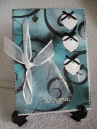 The cards are made up of layers of paper and are often called pasteboards. Acetate