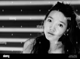 Jeune femme chinoise Banque d'images noir et blanc