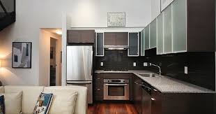 Industrial Loft Brings A Dash New York City Charm To Downtown Vancouver L Shaped Kitchen Small L Shaped Kitchens Modern Kitchen Design