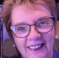 Can someone tell me how to soften a very stiff piece of aida. Tried soaking  it in fabric softener.