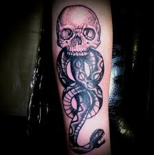 An inactive dark mark appears as a faint mark on the inner part of the left forearm, similar to that of a vivid red tattoo; The Dark Mark By Leif Hansen Tattoonow