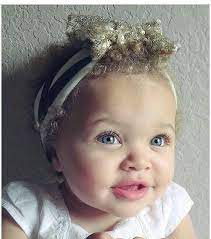 21:03 edt, 16 may 2011 Mixed Child With Blonde Hair Novocom Top