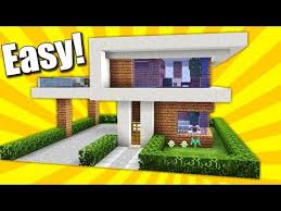 This modern mansion features a pool and a helipad. Minecraft Simple Easy Modern House Mansion Tutorial How To Build 10 Interior Easy Minecraft Houses Minecraft Modern Minecraft Modern House Blueprints