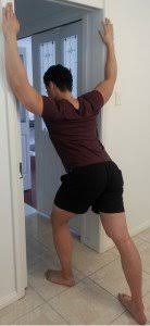 Roll your hips forward to place an arch in your low back. How To Fix Rounded Shoulders Best Exercises Posture Direct