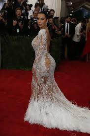 Kim kardashian finally stepped out at the met gala, wearing a stunning gold versace dress with cross detailing. Pin On Stylish Celebs