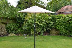 Tilt to follow the sun. Cambridge 2m Crank Tilt Garden Umbrella Taupe
