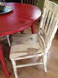 For a unique look, many homeowners are mixing 4. Distressed Round Country Kitchen Table Country Kitchen Tables Kitchen Table Decor Red Kitchen Tables