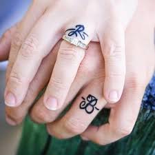 Rings are the best jewels you can get for your partner, especially if you're getting married! 76 Of The Most Inventive Wedding Band Tattoo Designs