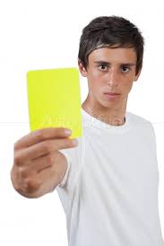 149) can an entire town be wrong? Young Man Holding Yellow Card Stock Photo Stockfuel
