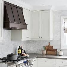White Kitchen With Coffee Stained Kitchen Vent Hood Kitchen Vent Hood White Wood Kitchens Kitchen Vent
