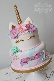 Unicorn cake with fondant flowers. Unicorn Themed 1st Birthday Cake With Marbled Fondant And Sugar Flowers By K Noe Erika L Pastel De Cumpleanos De Unicornio Pastel De Unicornio Tarta De Unicornio