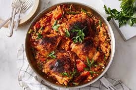 One Skillet Paprika Chicken Thighs Pepper Rice Recipe On Food52 Recipe Paprika Chicken Thighs Food 52 Paprika Chicken