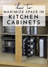 Tips for cleaning and organizing kitchen cabinets. How To Maximize Space In Your Kitchen Cabinets Tips Forrent Diy Kitchen Storage Kitchen Cabinet Organization Small Kitchen Organization