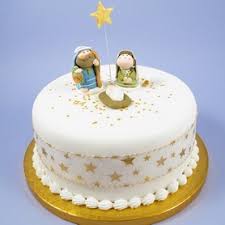Get a free monthly subscription to cake decoration and sugarcraft magazine. Icing Nativity Set With Gold Icing Star And Pick