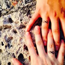 The couples can get some small it`s worse noting that the crowns tattooed with only a black color and with good shading. 55 Wedding Ring Tattoo Designs Meanings True Commitment 2019