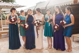 These purple wedding gowns are luxurious and conjure visions of opulence and grandeur. Mismatched Blue Green Purple Bridesmaid Dresses
