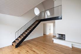 This accommodation features 2 bedrooms, 1 bathroom and a kitchen. Attikawohnung Haldenstrasse Buan Architekten
