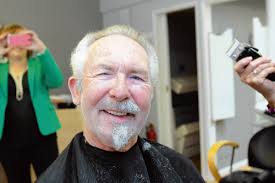 Close shave for mayor to raise charity cash