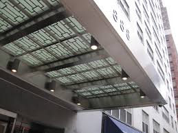 Glass wall mounted canopies able canopies glass canopies are manufactured to your specification; Doortec Architectural Metal Glass L L C Glass Canopies