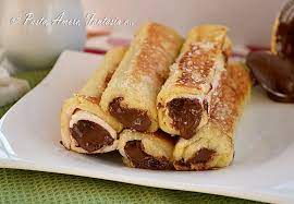 Frittelle di pane fritto con salumi e formaggi. Rotolini Di Pane Con Nutella Ricetta Dolce