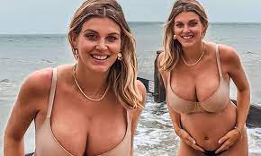 Ashley James displays her cleavage and growing bump after revealing she had  a benign tumour removed | Daily Mail Online
