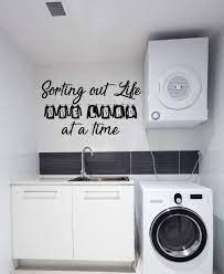 Most inexpensive way is with vinyl decals. Amazon Com Laundry Room Decor Vinyl Wall Decal Lettering Sorting Out Life One Load At A Time Quote Large Small Sizes Black Brown Red Blue Green Purple Other Colors Handmade