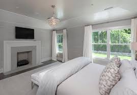 White And Gray Bedroom With Gray Stone Fireplace And Flat Panel Tv Contemporary Bedroom