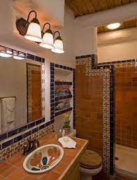 It plays with tiles that have the striking colors. 43 Mexican Style Bathrooms Ideas Bathroom Styling Mexican Style Spanish Bathroom