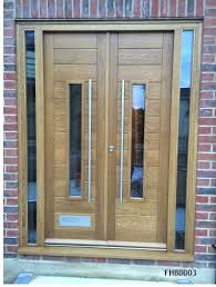 Many front door ideas combine different materials. Oak Contemporary Double Doors Contemporary Front Doors Door Design Wood Front Door Design