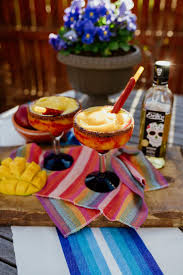 Maybe you would like to learn more about one of these? Mangonada Margaritas Muy Bueno Cookbook
