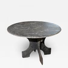 With a mixed material design of a bottom glass shelf, durable laminate tabletop, and round metal legs for an altogether stunning piece. Large Round Vintage Slate Table