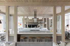 Small modern farmhouse with three bedrooms, minimalist design, open planning & vaulted ceiling. Modern Farmhouse Interior Designers Near Me