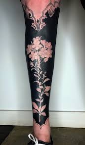 These Flower Tattoos With Deep Black Backgrounds Turn Arms And Legs Into Elegant Works Of Art Solid Black Tattoo Cover Up Tattoos Full Sleeve Tattoos