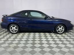 Image result for Cape Blue 1999 Tiburon