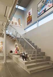 Modern curved staircase with glass railing. 73 Ideas For Modern Stairs Design Which Enhance The Home Individuality