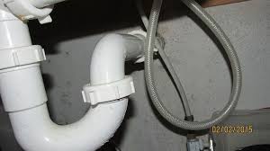 sink hose getting stuck under sink