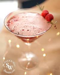 Cranberry and tart cherry juices, simple syrup, allspice and ginger are shaken with rum (if desired), then strained over ice and topped with ginger ale to make a sweet, spiced and warming concoction. Rum And Raspberry Cocktail Perfect Party Cocktail