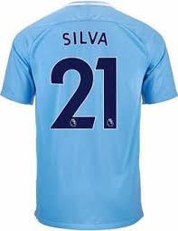 Man utd third kit jerseys are white with grey, black and gold embellishments that offer a marked contrast to the beige, grey, black and gold away kits and red, black and gold home kits worn by the red devils and their loyal fans. Nike David Silva Manchester City Home Jersey 2017 18 Soccerpro Manchester City Manchester Jersey