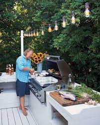 And The Living Is Easy Inside A Laid Back Montauk Weekend Retreat Outdoor Grill Area Outdoor Bbq Area Outdoor Barbecue Area