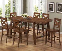 Cushioned seat with light brown textured polyester upholstery. Bar Height Dining Table Set