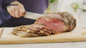 Check for doneness by piercing with a knife. Wegmans Garlic Studded Rib Roast Youtube