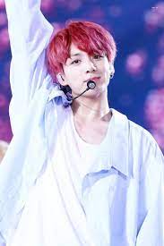 Near a river at night with cherry blossoms are flying in the air. Bts Jungkook S Cherry Red Hair Moments That We Need To See Again Kissasian