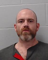 Firmin, Nikolas Lee was booked into the Hays County Jail