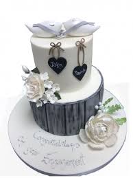 Tiers and layers are two different things. Doves Ring Engagement Cake